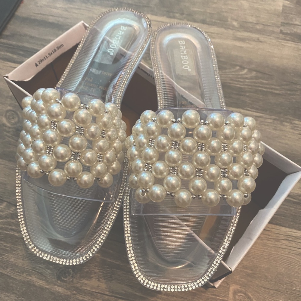 Ladies size 10 elegant slippers. Pearl design. Worn only once! Stylish!!